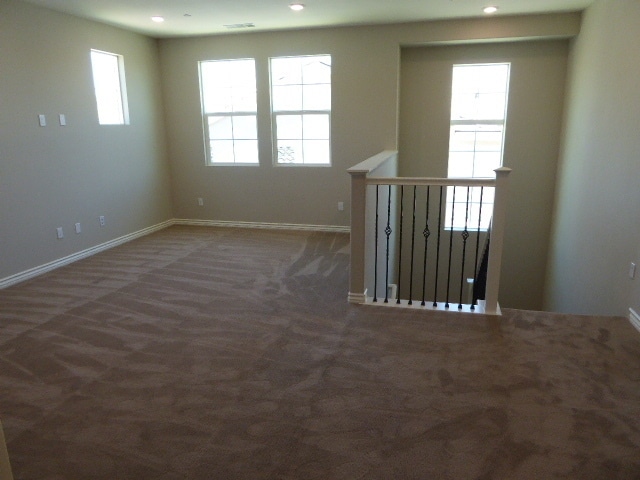 Building Photo - 4-Bedroom Home with Solar, Loft, and Gated...