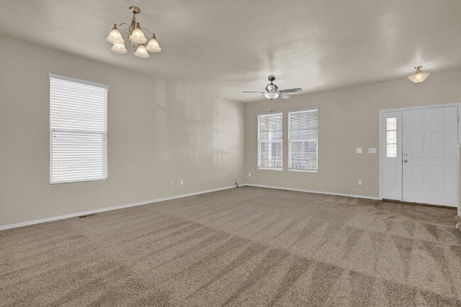 Building Photo - Spacious 3-Bed End-Unit Townhome with Mountain Views Near Ft. Carson