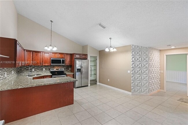 Building Photo - 9568 Boca Gardens Pkwy