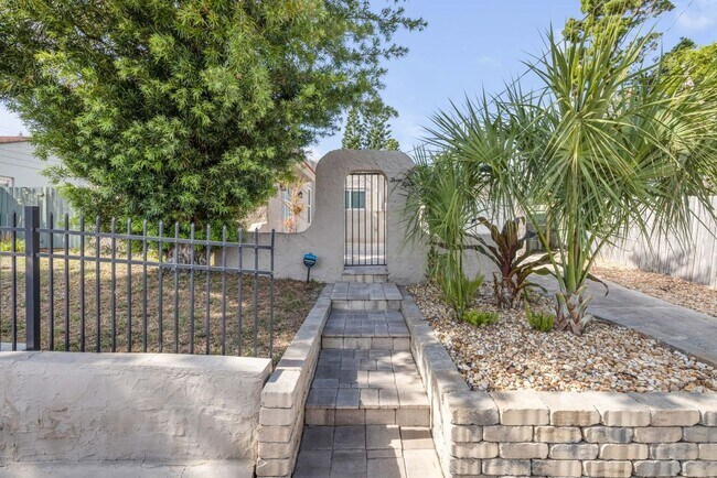 Building Photo - Renovated Spanish-Style 2/1 Beach Bungalow Just Steps to the Ocean!