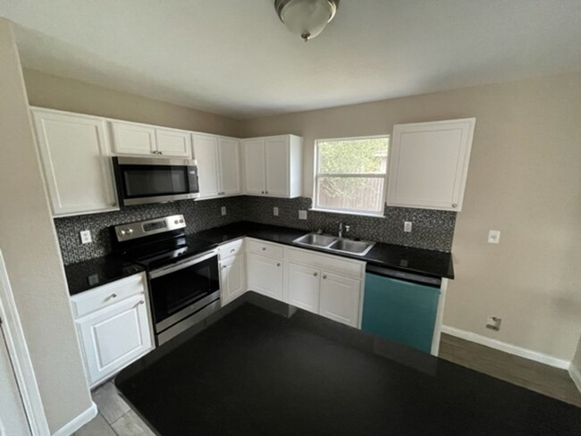 Building Photo - Newly Remodeled - A Must See Custom Home 3...