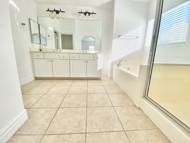Building Photo - STUNNING 2 STORY HOME IN A GUARD GATED COM...