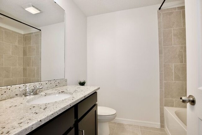 Building Photo - Luxurious 3/2.5 Modern Townhome with a Private Balcony and a 2 Car Garage in the Exclusive Gated ...