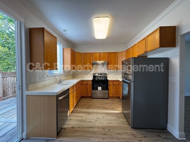 Building Photo - 3295 Newmark Dr