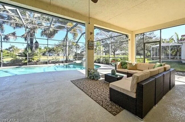 Building Photo - Lakefront 3 Bed + Den 2 bath home with pool and spa tub in Waterways of Naples Community