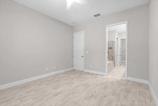 Building Photo - Move In Ready End Unit Townhome in Laureate Park | 3 Bed | Tesla Charger
