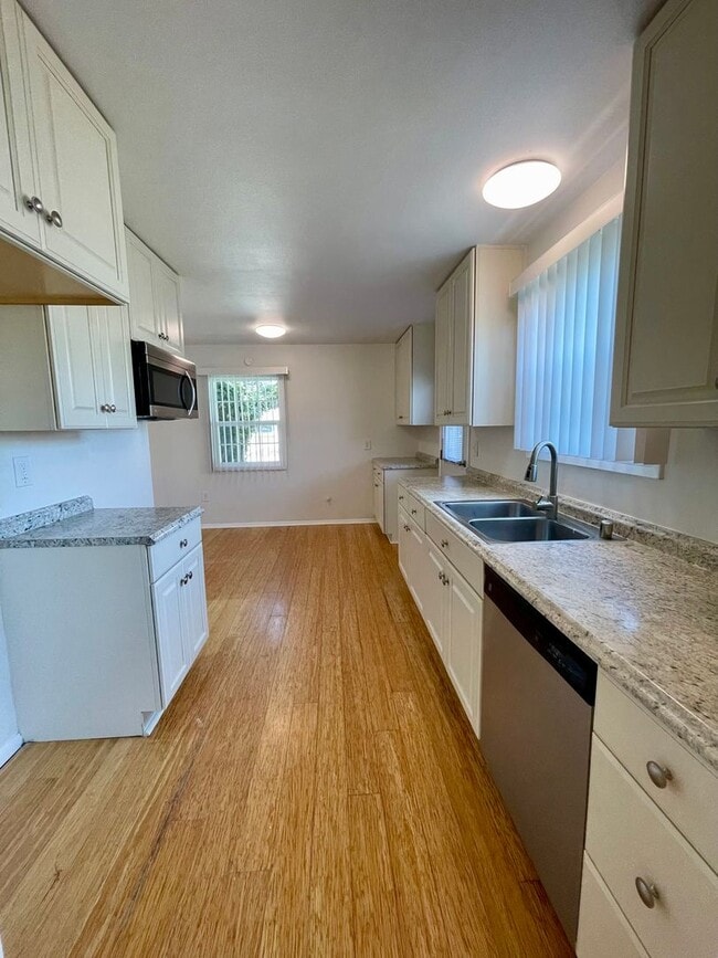 Building Photo - Updated 4-Bed 2-Bath | $4220 Mo | Large yard | Fruit Trees