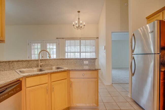 Building Photo - Updated 4BR/3BA Brick Home Near NAS Pensacola with Office & Screened Porch