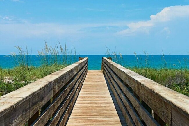 Building Photo - Beautifully Furnished Home in Upscale Gated Community