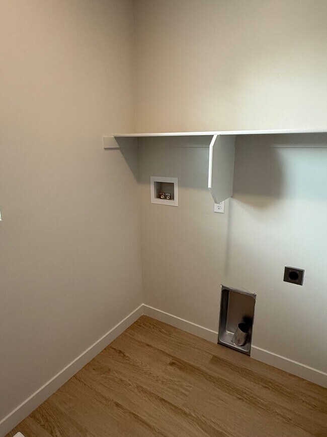 Building Photo - Half off first months rent - Beautiful townhome, construction just completed, 2 car garage, centr...