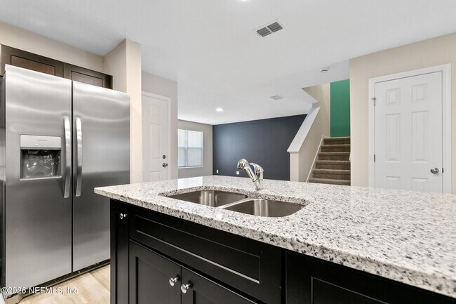 Building Photo - 8822 Eaton Ave