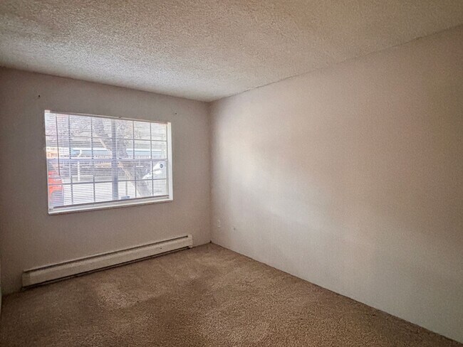 Building Photo - Spacious 2-Bedroom Condo in Denver's Monaco Lakes Community | $1,295/mo