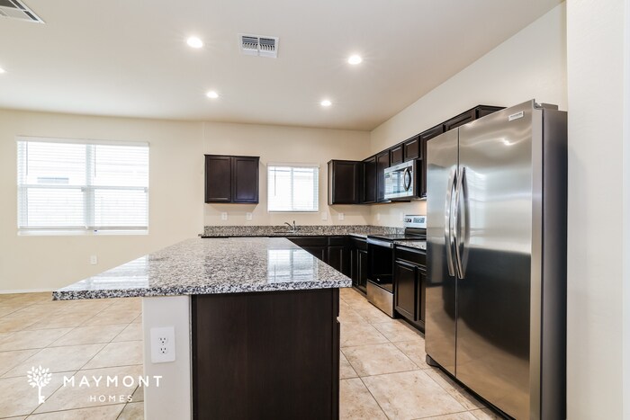 Building Photo - 1867 W Broadway Ave