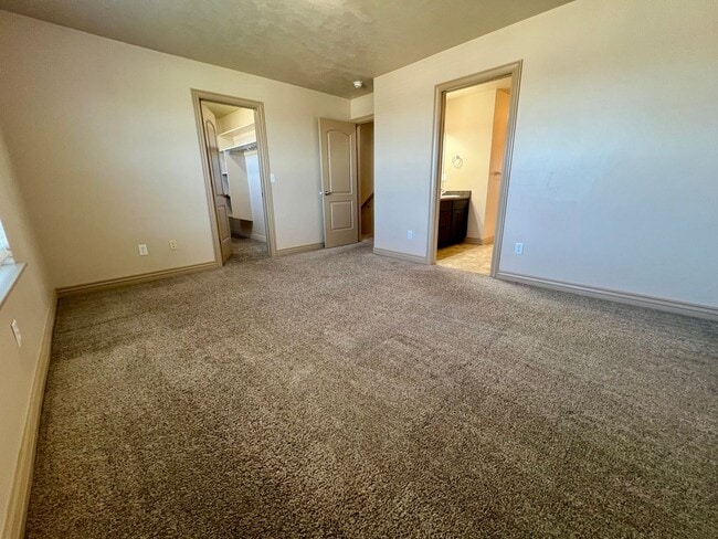 Building Photo - PRICE REDUCED:  LG 4-BED TOWNHOUSE NOW $1,995