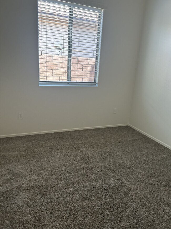 Building Photo - Unfurnished four bedroom large home!  Three car garage