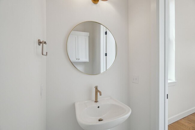 Building Photo - Classic Cape Cod Meets Modern Glam: Your D...