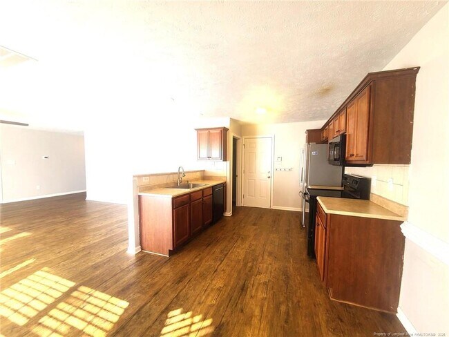 Building Photo - 5215 Woodpecker Dr