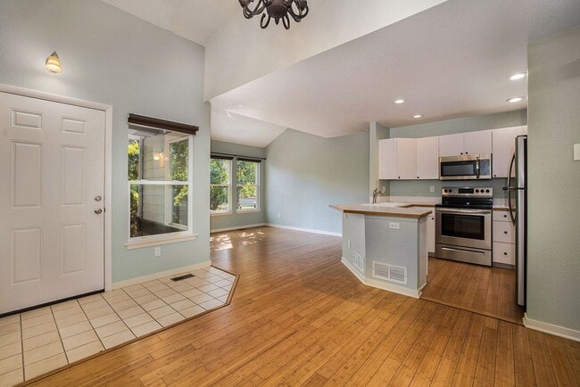 Building Photo - 2 bedroom, 3 bath townhome is now available. *5 MONTH LEASE WITH OPTION TO RENEW FOR 12*