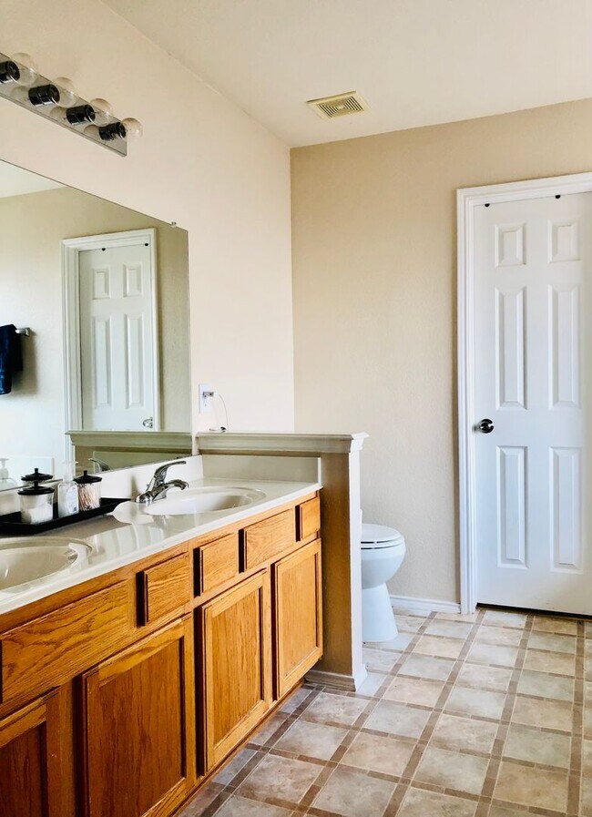 Building Photo - Coming Soon Spacious 4-Bedroom Home for Re...