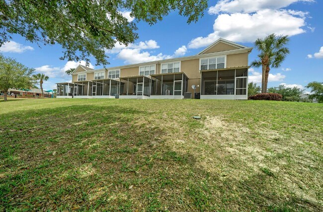 Building Photo - Corner Unit ~ Lake View ~ Maintenance Free...