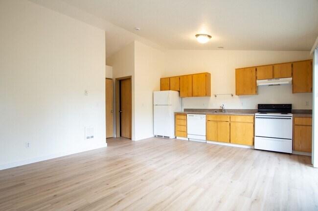 Building Photo - FREE RENT: Contemporary One Bedroom w/New Luxury Vinyl Flooring + Vaulted Ceilings!