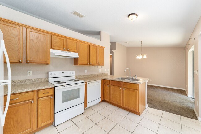 Building Photo - Peaceful 3-Bedroom Home with Open Floor Plan & Two-Car Garage in Rainbow Lakes Estates!
