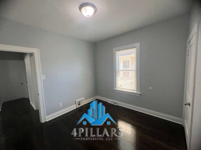 Building Photo - "Charming 3-Bed Home with Partially Finished Basement & Gleaming Hardwood Floors in Hammond - 226...