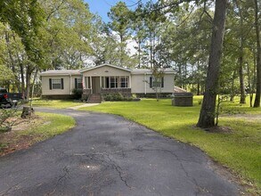 Building Photo - Immaculate 4BR Mobile Home in the heart of...