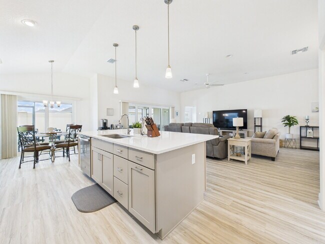 Building Photo - Furnished 3/2 in Water’s Edge | Golf Cart ...