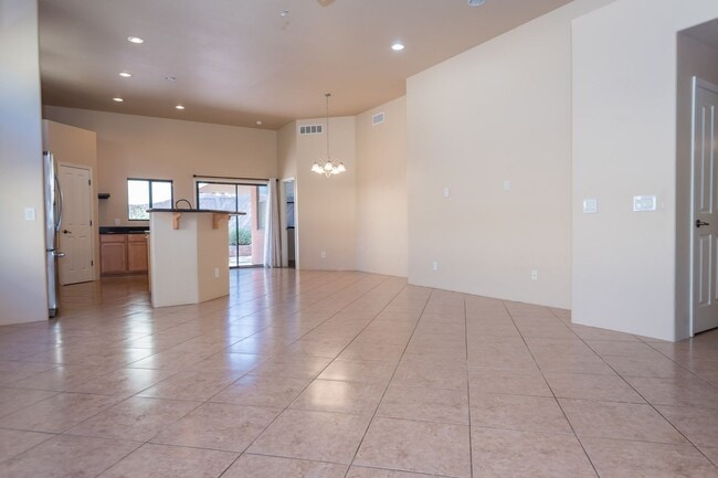 Building Photo - Gorgeous 3 Bedroom 2 Bathroom Home with Tile Throughout! Central A/C, 2 Car Garage!