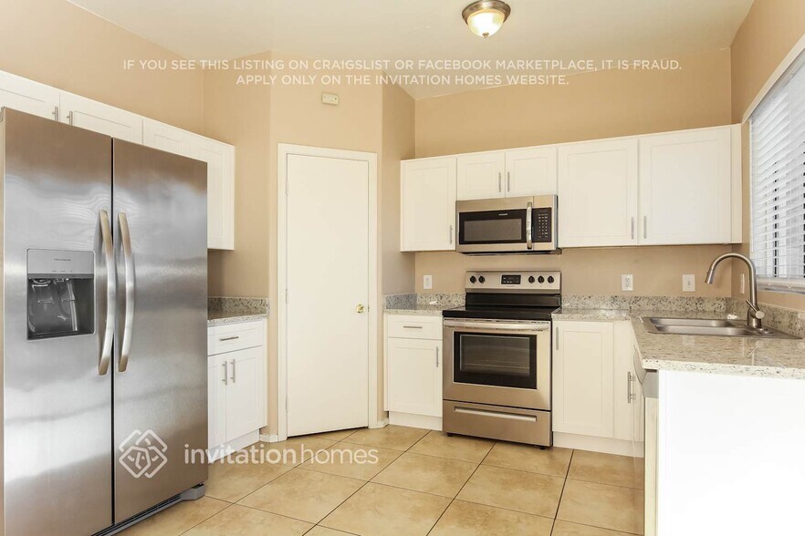 Building Photo - 6965 W Midway Ave