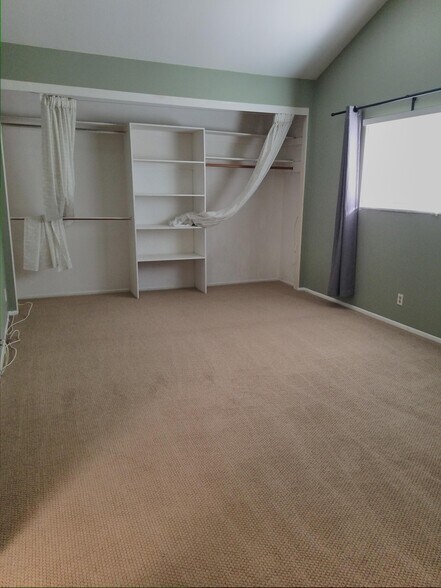 Huge closet and brand new carpet in master bedroom. - 18681 Maplewood Cir