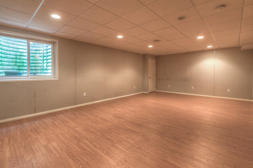 finished basement with window great for rec room or home office space. - 22810 West 71st Terrace