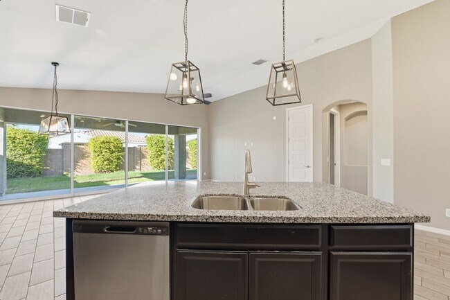 Building Photo - Stunning 4-Bed + Den Eastmark Home with Modern Upgrades Throughout