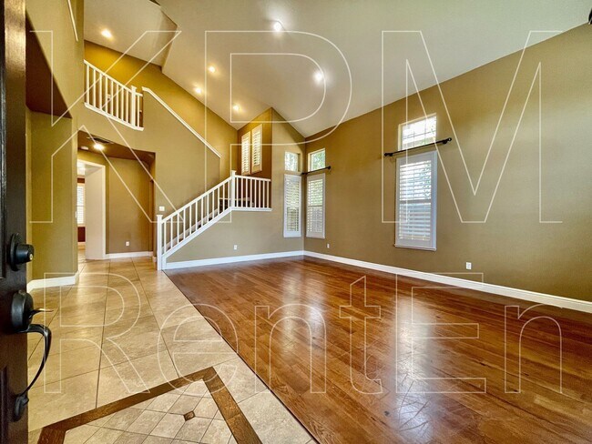 Building Photo - 5879 Riverbank Cir