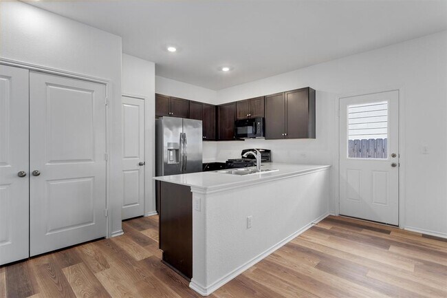 Building Photo - 7704 Poppy Petal Dr