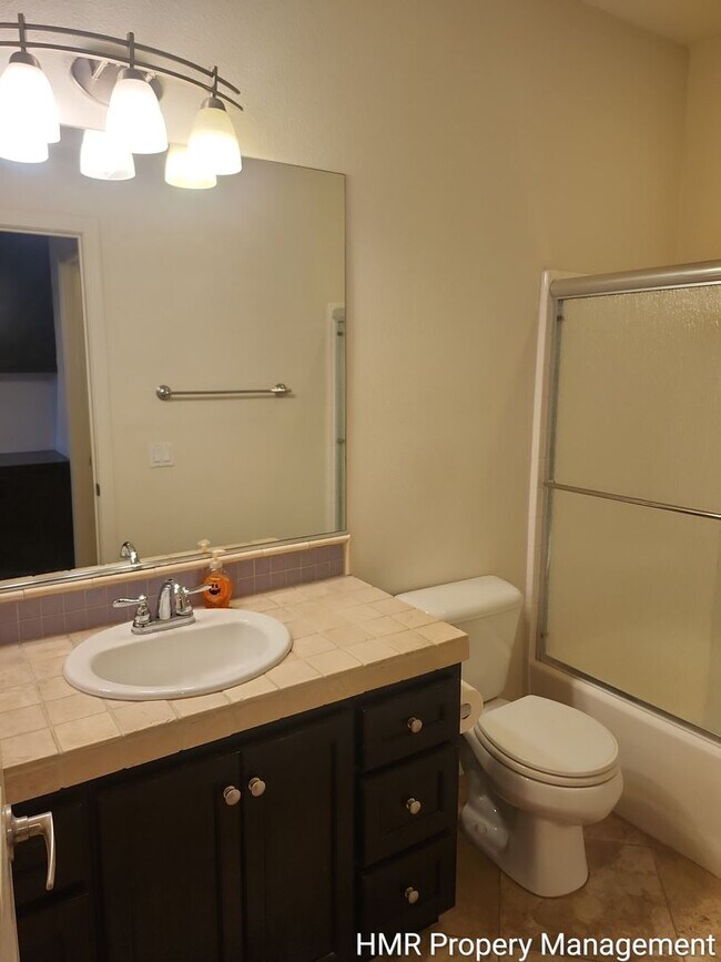 Building Photo - Modern 2-Bedroom Condo Near Victoria Gardens