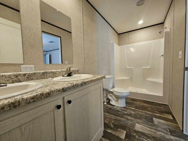 Building Photo - 6701 Hidden Oaks Dr