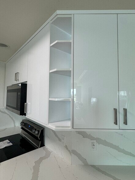 Updated cabinets, island/breakfast bar, and counters (shown) - 2743 1st St