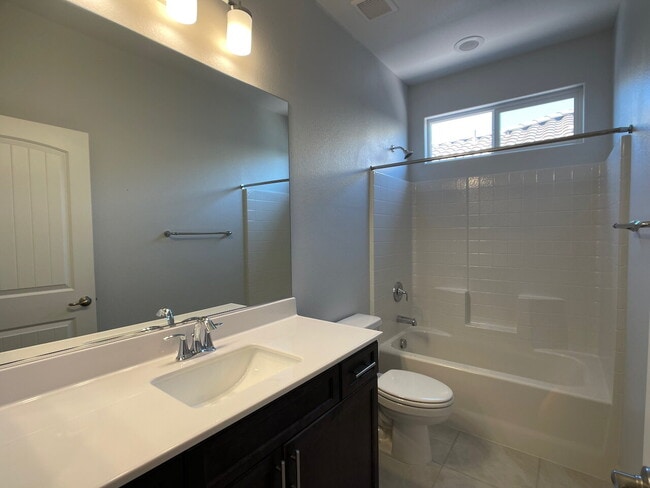 Building Photo - 4 BED 2 BATH 2 CAR GARAGE SINGLE STORY SINGLE FAMILY HOME w/ PAVED BACKYARD IN CADENCE COMMUNITY,...