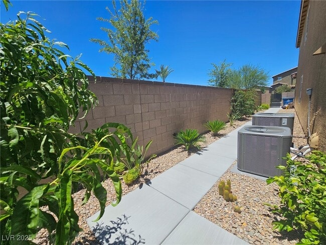 Building Photo - 7497 Blue Lotus Ave