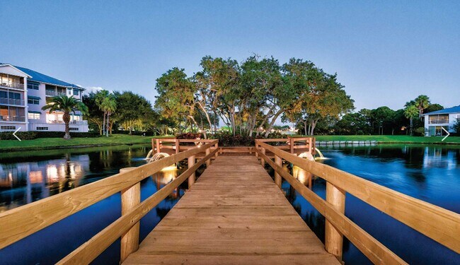 Building Photo - Coastal Luxury at Hidden Bay | 3BR Waterfront Condo with Bay Views