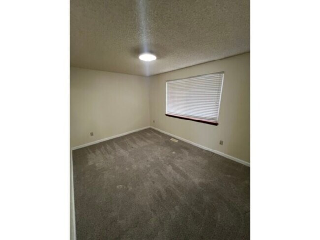 Building Photo - 9941 W Layton Ave