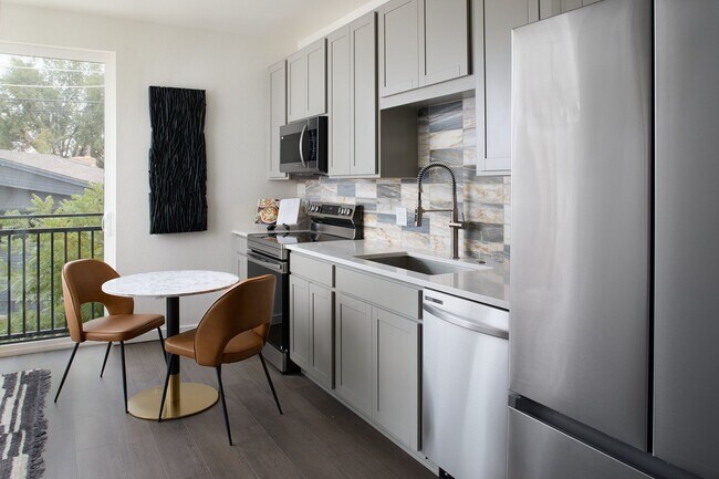 Building Photo - SLOANS LAKE NEW CONDO! Brand new construct...