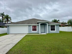 Building Photo - 4 Bedroom 2 Bath Home in Poinciana Village 3