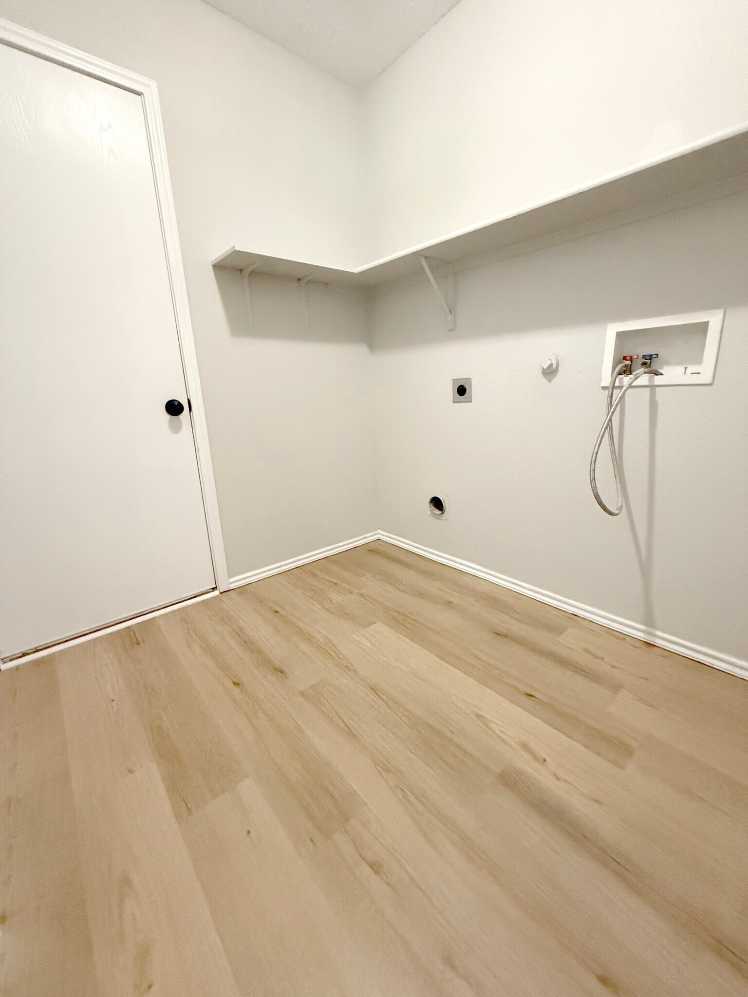 Laundry Room - door to garage. - 1419 Windy Meadows Dr