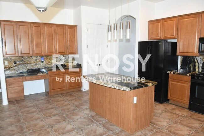 Building Photo - 4 BD + Office, 2.5 BA. 3-Car Garage w/ Pool in Litchfield Park!