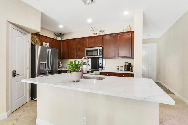 Building Photo - 9504 SW Merlin Ct