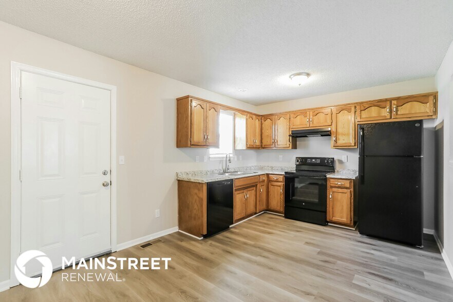 Building Photo - 1024 NE Queens Ct