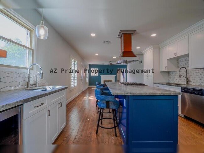 Building Photo - 6521 N 11th Ave